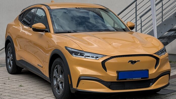 Orange Ford Mustang Mach-E electric crossover (cropped)