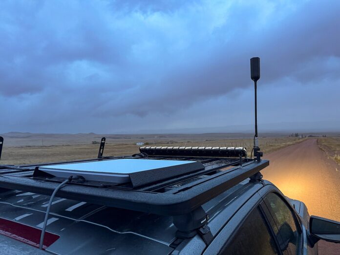 Starlink flat high-performance dish mounted on the roof of a truck